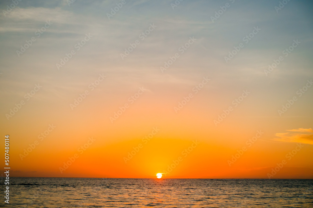 Orange sunset by the sea