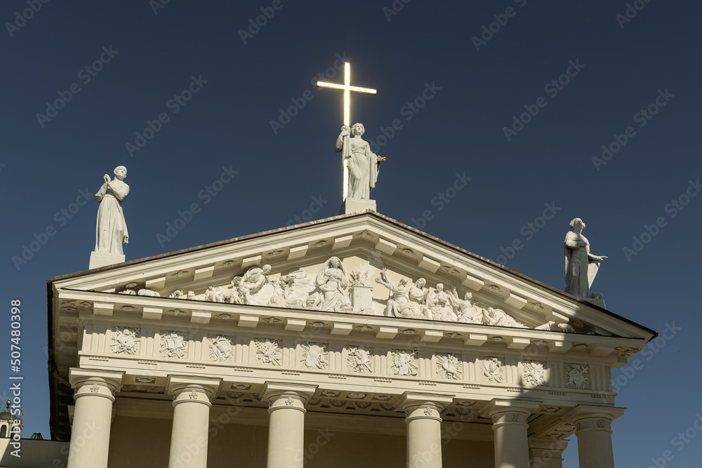 VILNIUS, LITHUANIA - May 23, 2022: Cathedral Basilica of St Stanislaus and St Ladislaus on the Cathedral Square against the blue sky