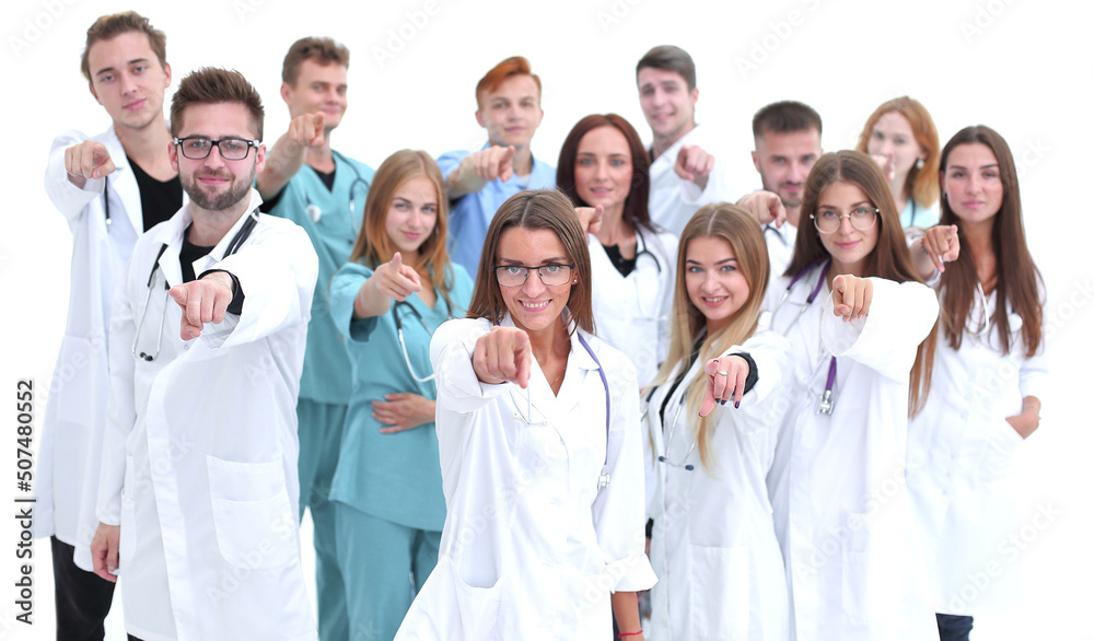 group of diverse medical professionals pointing at you