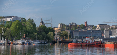 Photography Panorama view over motor boats at piers in the islands Skeppsholmen and Blasieho