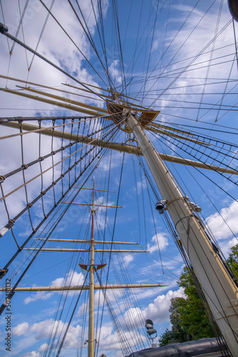 Rigg of the hostel three master fully rigged new restored ship af Chapman in the bay Strömmen a sunny summer day in Stockholm