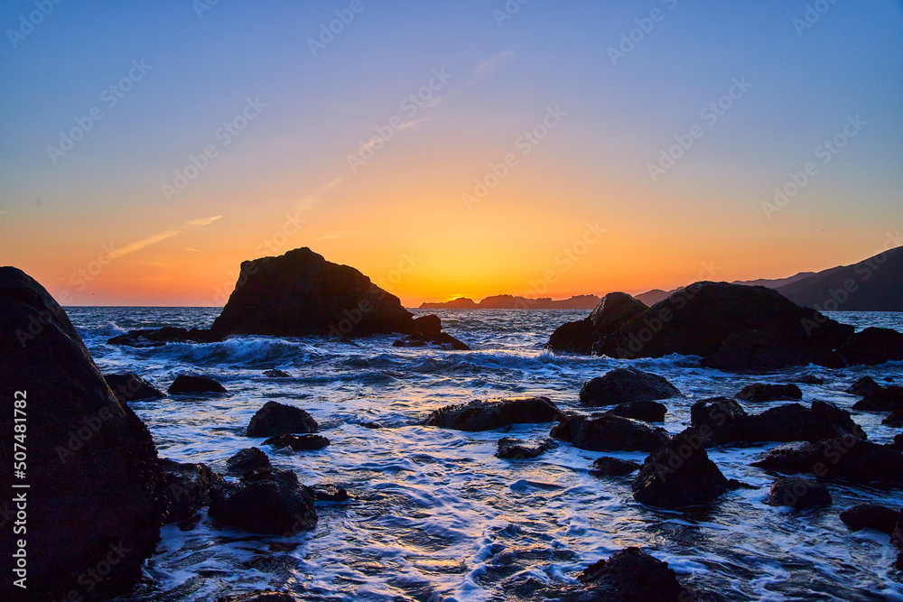 Golden hour on ocean beach of west coast California