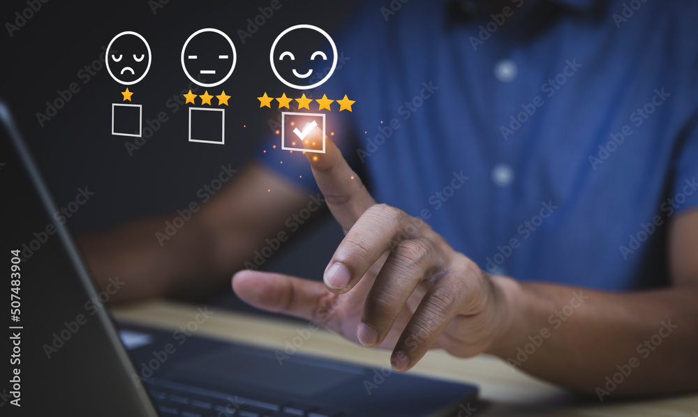 Obraz premium User give rating to service experience on online application, Customer review satisfaction feedback survey concept, Customer can evaluate quality of service leading to reputation ranking of business. 