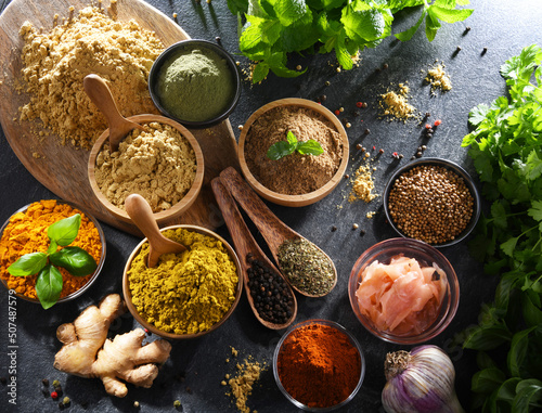 Fototapeta Naklejka Na Ścianę i Meble -  Composition with assortment of spices and herbs