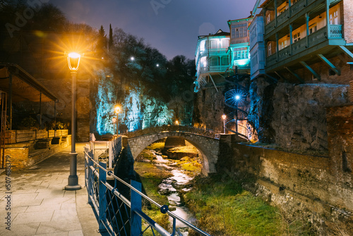 Tbilisi, Georgia, Night Scenic View Of Bridge of Love in Bath District - Is The Ancient District Of Tbilisi, Georgia. Hanging houses above rvier in canyon. photo