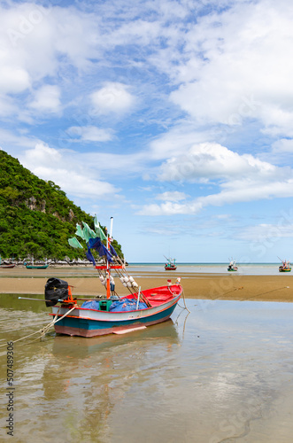 Fishing boats along the shores by the sea