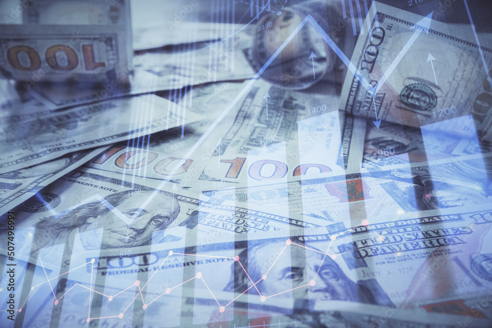 Fototapeta premium Multi exposure of forex chart drawing over us dollars bill background. Concept of financial success markets.