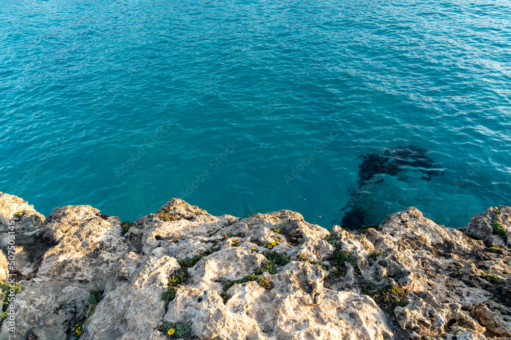 blue sea and cliff rocks at mallorca spain
