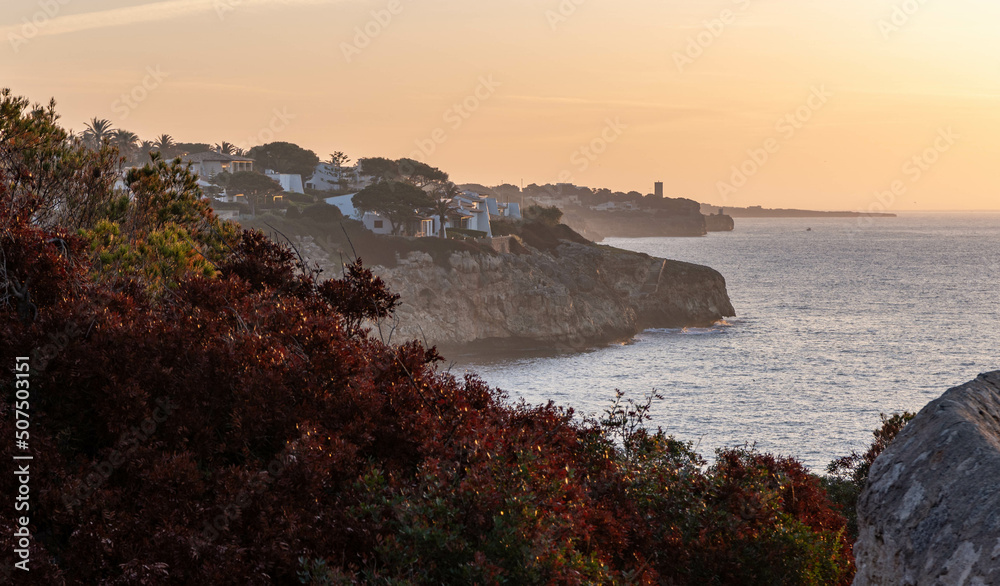 sunset over the coast of mallorco near porto christo novo