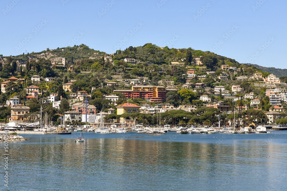 Scenic view from the sea of the harbor of Rapallo, popular tourist destination in the Riviera of Levante, Genoa, Liguria, Italy