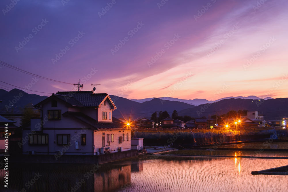 The orange purple sunset in the Japanese village is very beautiful and peaceful