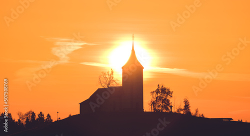 Sun burning through the church in the early morning.