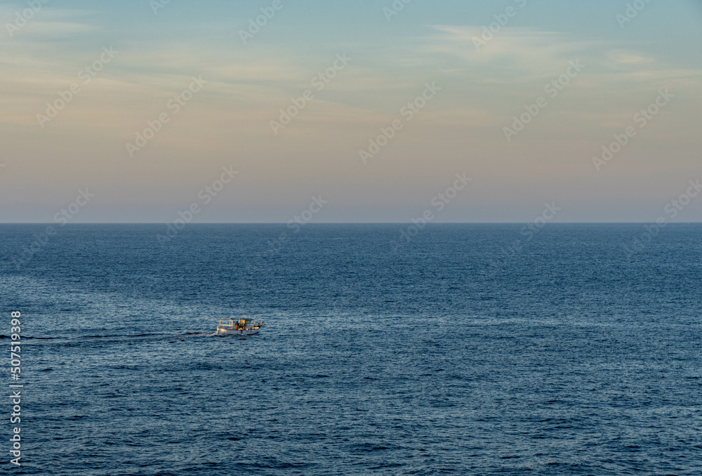 lonely boat on the mediterranea sea