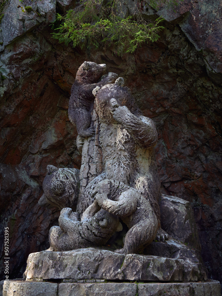 Sculpture Bear family by sculptor Robert Stigell (1852-1907) in Aulanko park of nature reserve near Finnish Hamanlinna.