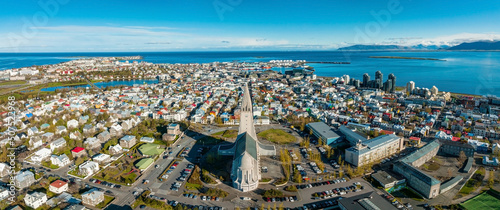 Aerial view of the Hallgrimskirkja Church in Reykjavik. Scenic view of Iceland in 4k. Hallgrimskirkja Lutheran Church. Statue of Leif Eriksson. photo