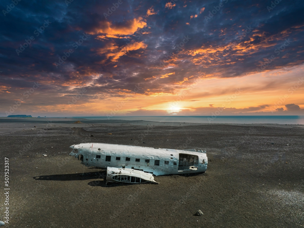 Aerial view of the old crashed plane abandoned on Solheimasandur beach near Vik in Iceland. Landscape with popular tourist attraction in Iceland. Exciting excursion to the sights view in winter
