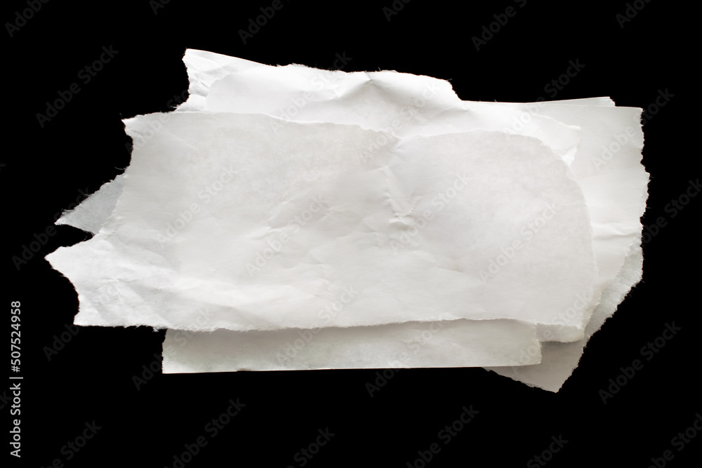 a white piece of paper on a black isolated background a white piece of paper on a black isolated background