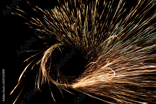  sparks in the dark. lines of light.