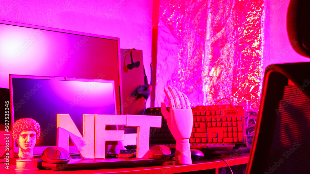 NFT Non-Fungible Token and artificial arm. NFT inscription and ancient greek sculpture in pink neon light. Concept of crypto art and blockchain technology NFT Non-Fungible Token and artificial arm. NFT inscription and ancient greek sculpture in pink neon light. Concept of crypto art and blockchain technology