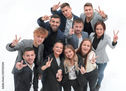 top view. happy business team standing in the new office