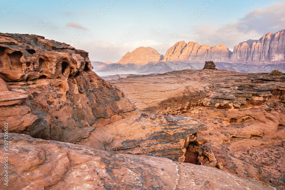 Red sandstone rocks formations in Wadi Rum also known as Valley of the Moon desert, Jordan, scene reminiscent to Mars planet