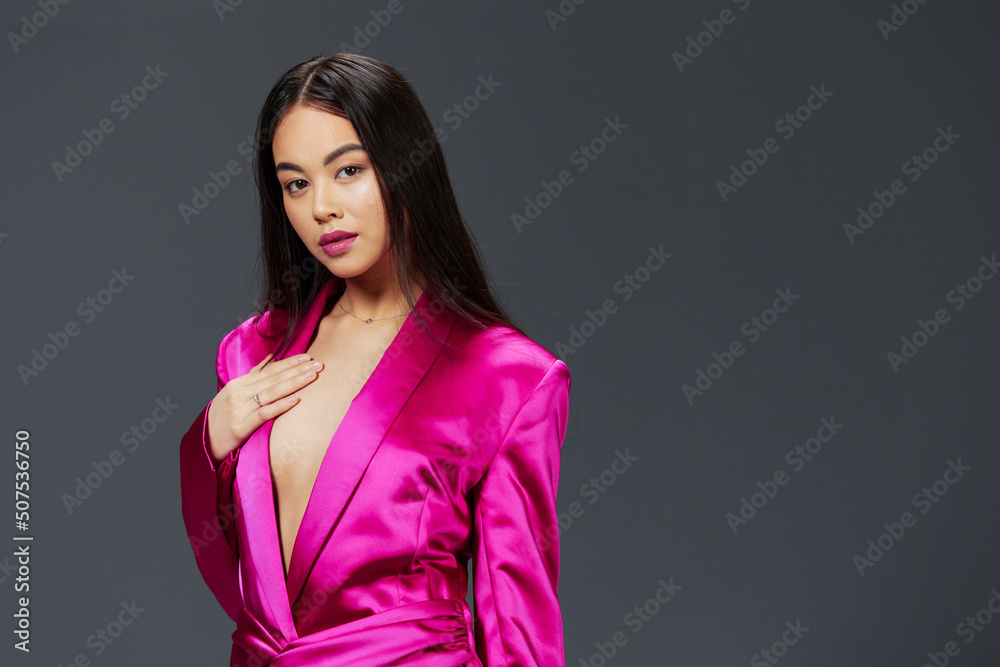woman in a pink mini dress luxury isolated background woman in a pink mini dress luxury isolated background