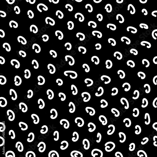 Texture seamless pattern of white hooks on a black square background
