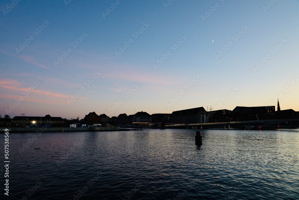 sunset over the river in Copenhagen Denmark