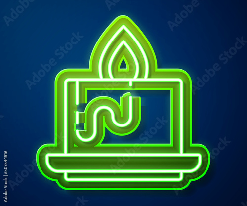 Glowing neon line Aroma candle icon isolated on blue background. Vector