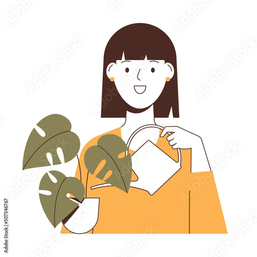 Happy cute woman is taking care and watering plant. Home garden concept.