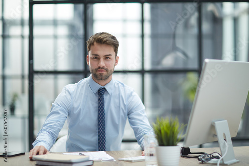 Young businessman working at office