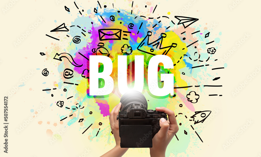 Close-up of a hand holding digital camera with abstract drawing Close-up of a hand holding digital camera with abstract drawing