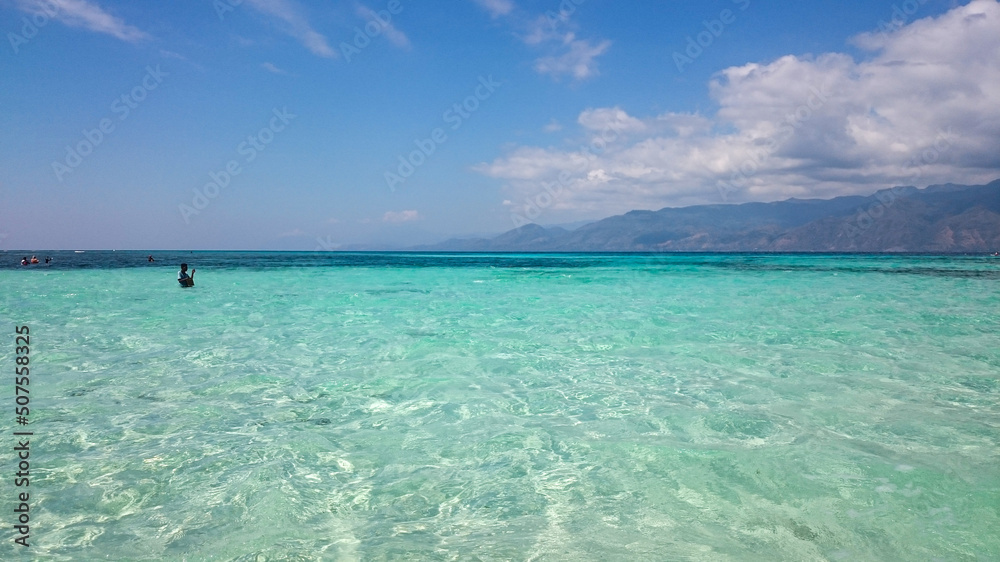 Alor Island has a very beautiful beach. Beach with white sand and very clear water. Alor Island has stunning views and nature.