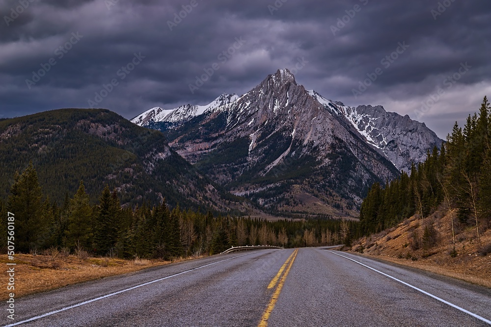 Naklejka premium Gloomy Clouds Over Mountain Roads