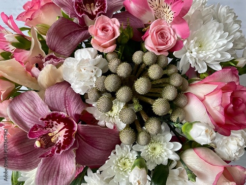 bouquet of different flowers, pinl, lilac, white roses. Wedding arrengement. Preparation of wedding ceremony photo