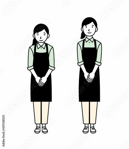 お辞儀をする女性店員