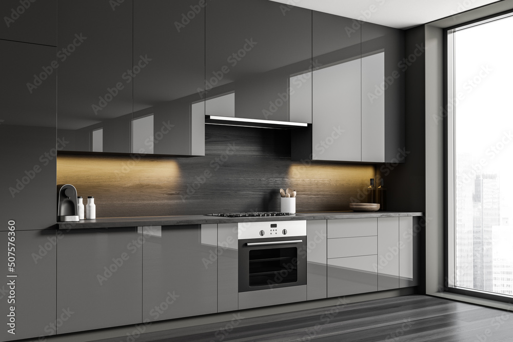 Grey kitchen interior with shelves and appliances, panoramic window Grey kitchen interior with shelves and appliances, panoramic window
