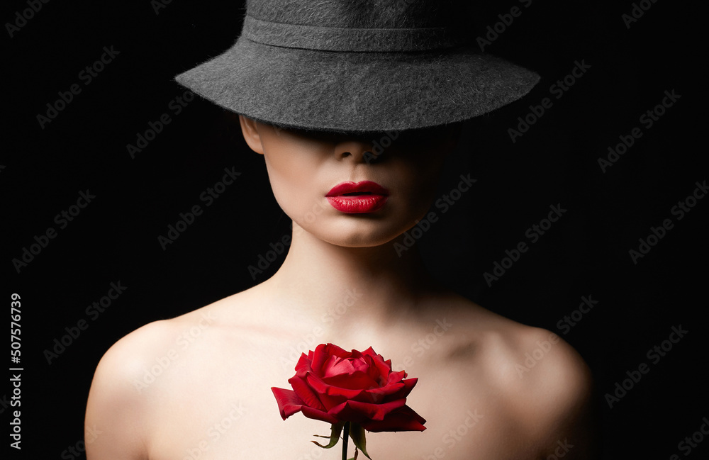 Fototapeta premium Beautiful young Woman In Hat and Flower