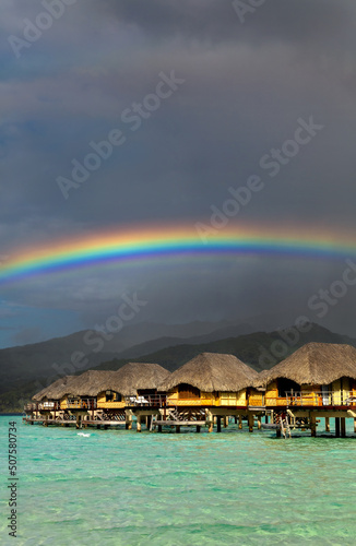 Rainbow arch over Bora Bora luxury Overwater bungalows