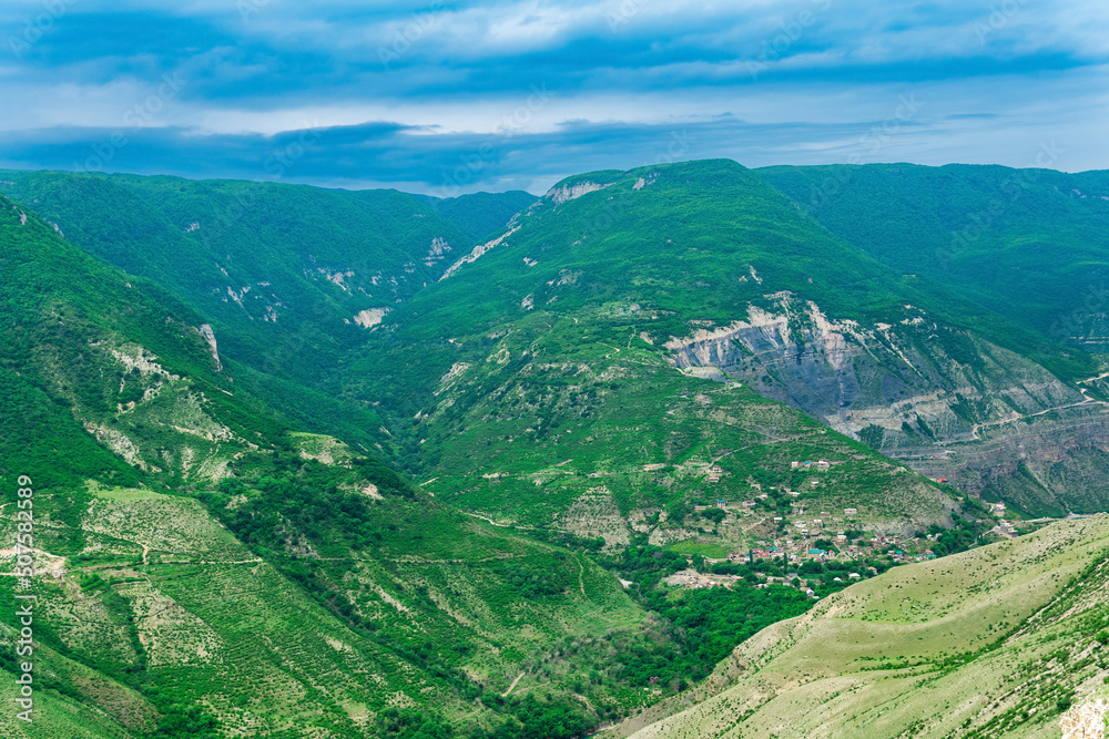 Mountain landscape in the Caucasus in Dagestan, view of the canyon of the Sulak River with the village of Old Zubutli in the distance on the slope