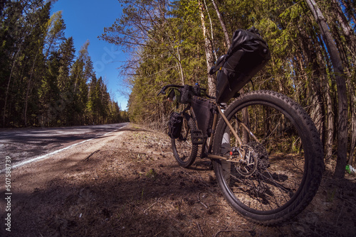 Billede på lærred Bicycle with bags for transporting things on a trip