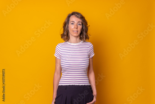 Caucasian girl on with yellow background tourist concept