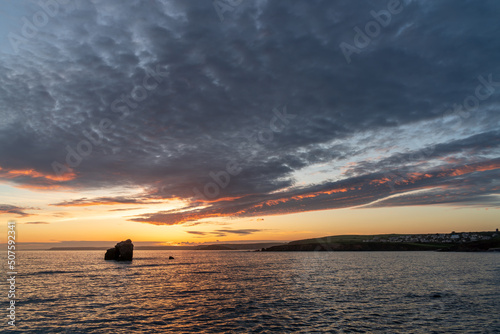 Sunset at Thurlestone Rock, South Milton Sands in Devon photo