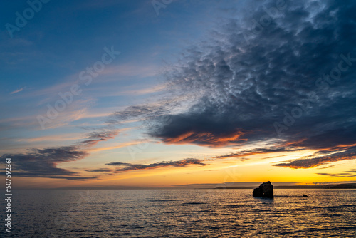 Sunset at Thurlestone Rock, South Milton Sands in Devon photo