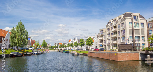 Obraz na płótnie Panorama of a canal in the Waterfront neighbourhood in Harderwijk, Netherlands w salonie