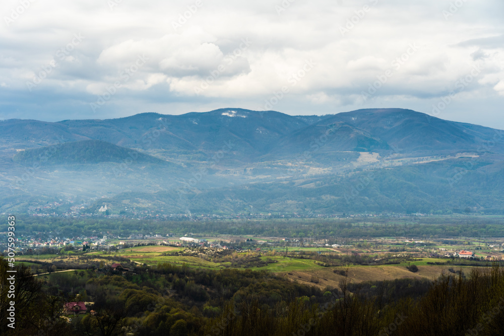 Scenic view Of beautiful clouds in sky over mountain valley