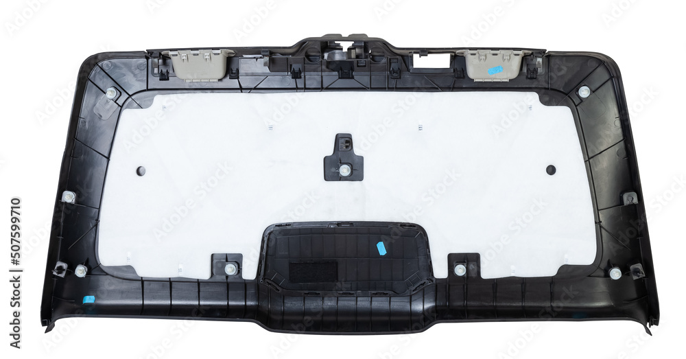 Sheathing of a car body part - trunk made of black plastic on a white isolated background in a photo studio for replacement or sale in a workshop Sheathing of a car body part - trunk made of black plastic on a white isolated background in a photo studio for replacement or sale in a workshop