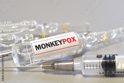 Vaccination for Smallpox and Monkeypox (MPXV). Syringe with vial of the doses vaccine for Monkeypox (MPXV) disease. photo