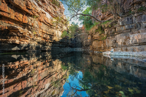 A lady is enjoying beautiful The Grotto in Wyndham  Kimberley  Western Australia