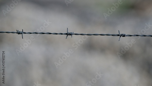 Photos Barbed wire on a roadblock in the occupied countries of war Ukraine